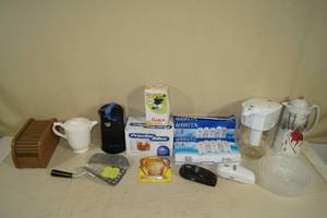 lot 150 image: Kitchen Items - Can Openers, Water Filter