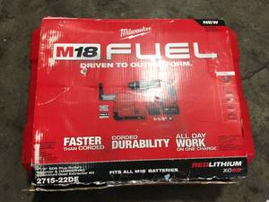 lot 10 image: Milwaukee M18 FUEL 18-Volt Lithium-Ion Brushless Cordless 1-18 in. SDS-Plus Rotary Hammer WDust Extractor, (2) 5.0Ah Batteries (review pictures)