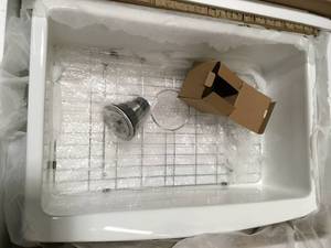 lot 18 image: VANITYFUS  Ceramic 30 in. Single Bowl Farmhouse Apron Kitchen Sink with Grid and Strainer (review pictures)