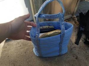 lot 446 image: Lot of (Approximately 6) Womens Bags  - Blue Hand Bag, Black Purse, Flower Purse, Yoa Red Clutch, Gold Purse, Turquoise Bag She Leaves A Little Sparkle (in original packaging)