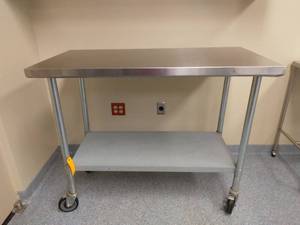lot 3 image: MSRP $600 Medical NSF Grade Mobile Stainless Steel Surgical Instrument Table with Galvanized Steel Under Shelf On Wheels - Good Sturdy Condition - Suitable For Clinics, Laboratories, Kitchen, Restaurants & Food Production