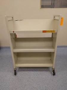 lot 19 image: MSRP $600&nbspBretford Single Sided Steel Book Utility Truck 3 Shelves - Sand Color - Great Condition Contents Not Included