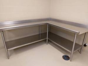 lot 45 image: MSRP $2800 Heavy Gauge Stainless Steel Corner Cleaning Dish Prep Work Table With Rolled Top Sides & Stainless Steel Under Storage Shelf - Excellent Condition