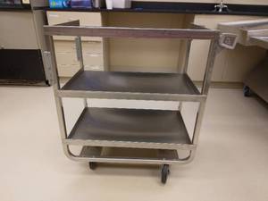 lot 48 image: MSRP $1800 Lakeside Mfg Imperial Heavy Duty Stainless Steel 3-Shelf Storage Cart With 3 Sided Guard Rail On Each Shelf - Great Rolling Condition
