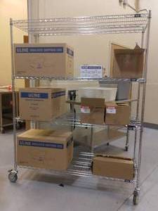 lot 71 image: MSRP $300 ULine 3 Shelf Stainless Steel Wire Storage Rack Cart - Excellent Condition Contents Not Included