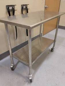 lot 72 image: MSRP $600 ULine H-6913 Mobile Stainless Steel NSF Work Table Cart -&nbspUsed in almost every commercial kitchen and food processing plant- Excellent Condition