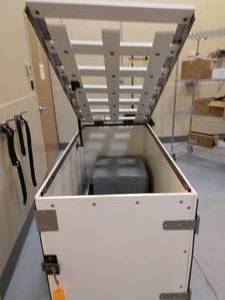 lot 81 image: Large Animal Transfer Wood Laminate Crate On Wheels - Very Heavy & Solid - Wheels Are Slow To Push - Crate Is In Great Shape Cube Not Included