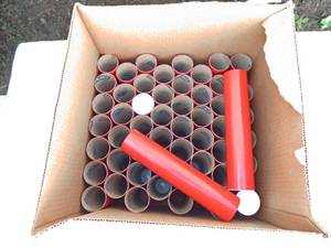 lot 137 image: Case of 54 Uline Red Shipping Tubes With End Caps
