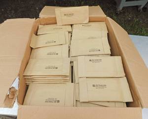 lot 206 image: Case of Jiffy #000 Padded Mailers - Open Case - Near Full