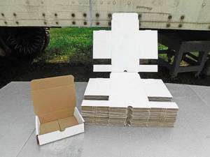 lot 225 image: Lot of 38 Uline White Indestructo Mailer Boxes
