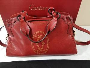 lot 99 image: Cartier Purse