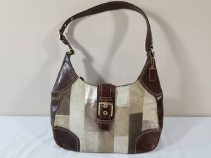lot 104 image: Coach Purse