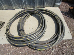 lot 84 image: Garden Hoses