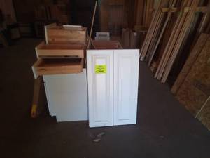 white cabinets and cabinet parts