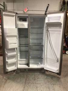 24.6 cu. ft. Side by Side Refrigerator in Monochromatic Stainless Steel by Whirlpool see pictures in good working condition