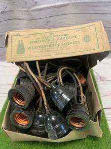 lot 32 image: A Lot of 25 Antique Bakelite Weatherproof Sockets