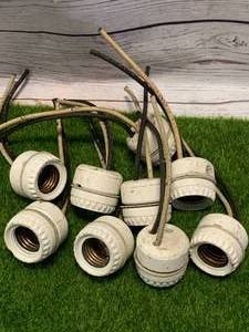lot 33 image: Lot of Nine Bakelite Vintage Sockets
