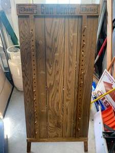 lot 43 image: Antique Daisy BB Gun Display 24x 55