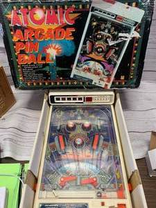 lot 77 image: Vintage TOMY Tabletop Atomic Arcade Pinball (Sold $125 On Ebay)