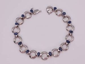 lot 7 image: 4.20 Carat Natural Blue Sapphire and Diamond Omega Link Tennis Bracelet in 14k White Gold