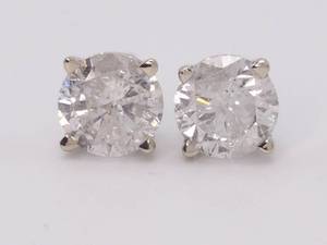 lot 9 image: Magnificent 1.20 Carat Diamond Stud Earrings in 14k White Gold
