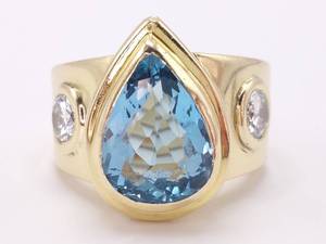 lot 10 image: 5.38 Carat London Blue Topaz and Diamond StatementRing in Heavy 18k Yellow Gold