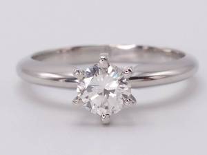 lot 11 image: Exquisite 12 Carat Diamond Solitaire Ring in Platinum
