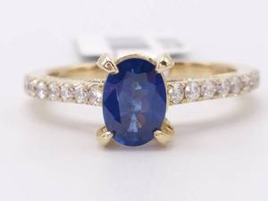 lot 16 image: New 1.36 Carat Blue Sapphire and Diamond Lined Ring in 14k Yellow Gold $2,500 With Tag