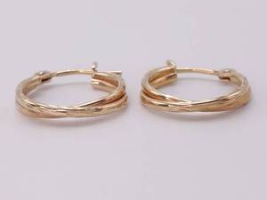 lot 53 image: Twist Yellow Gold Hoop Earrings