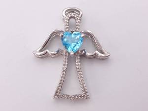 lot 55 image: Heart Shaped Blue Topaz and Diamond Angel Estate Pendant