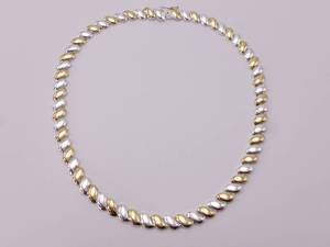 lot 58 image: Alternating Silver and Golden Colored Swoosh Link Necklace