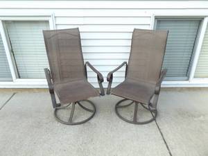 lot 61 image: 2 - 360 Swivel Outdoor Patio Rocking Chairs