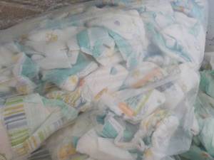 Bag of 100 or So Diapers and case o...