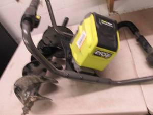 lot 154 image: ryobi 40 volt auger , auger and hea...
