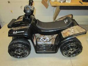 lot 225 image: real tree battery powered 4 wheeler...