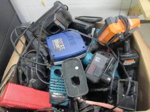 lot 309 image: box full of chargers , batteries an...