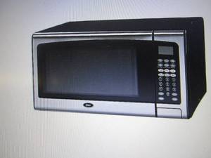 Oster 1.3 Cu. Ft. 1000-Watt Counter...