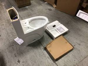 Buxton 1-Piece 1.6 GPF1.1 GPF Dual Flush Elongated Toilet in White by Glacier Bay