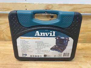 lot 22 image: ANVIL 76 piece homeowners tool set w scissors, pliers, hammer, screwdrivers, and more bifold plastic carrying case included