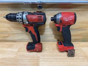 lot 29 image: MILWAUKEE Cordless DrillDriver, 12 in Chuck Size and MILWAUKEE M18 FUEL 18-Volt Lithium-Ion Brushless Cordless 14 in. Hex Impact Driver. (TOOL ONLY)