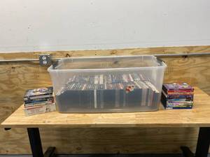 lot 51 image: Bin full of DVDs