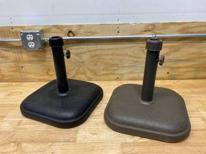 lot 86 image: STYLEWELL Lot of 2-  26 lbs. Concrete and Resin Patio Umbrella Base (one in black and one in brown)