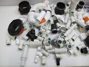 lot 571 image: Box Lot of Plumbing Pipes, Elbows, and Connectors