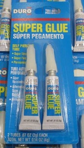 lot 575 image: Lot of 9 Packs DURO Super Glue - Self Piercing Tubes - 18 Tubes