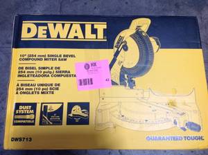 lot 42 image: DEWALT 15 Amp Corded 10 in. Compound Single Bevel Miter Saw (good condition) see pictures