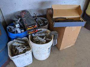 lot 943 image: Large Lot of Misc. - Lumber Brackets, Water Filter System and (3) New in Box Grease Guns - NO SHIPPING