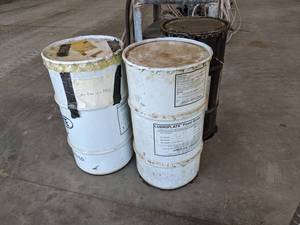 lot 976 image: (2) 120 LB Drums of Lubriplate FGL-#0 Grease - These feel pretty full, 1 is marked contaminated and (1) 16 Gallon Lubriplate 630-M Grease Drum - About 50% Full - NO SHIPPING