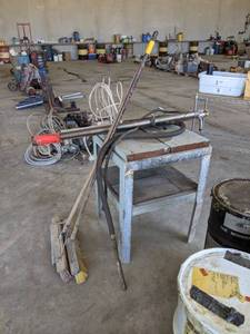 lot 977 image: Lot of (3) Barrell Pumps, Steel & Wood Worktable - 25 x 24 x 32 High and Push Brooms - NO SHIPPING