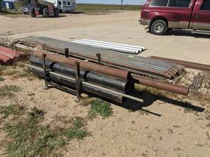 lot 886 image: Rack w Steel Pipe 4 and 6 Diameter - Longest is about 126 - NO SHIPPING
