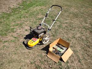 lot 11 image: DR 5 hp. Trimmer Mower...
